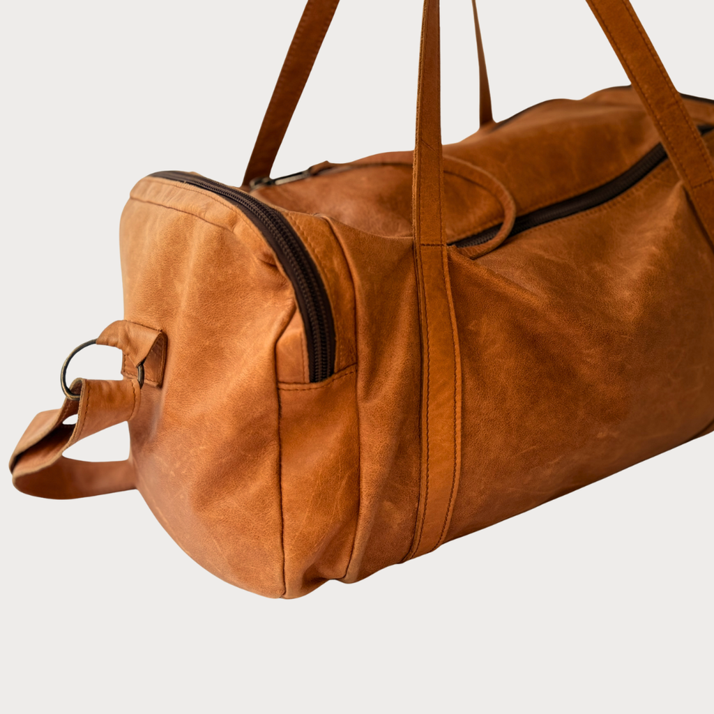 Luke Bag – Side View – Toffee Leather Duffel Bag