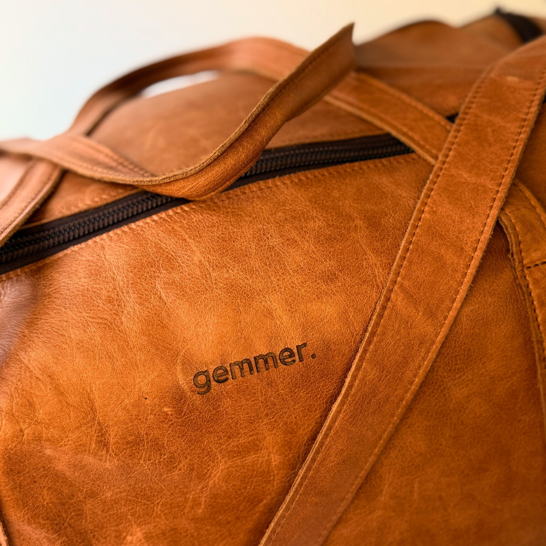 TRVL Duffel Bag Large – Side Detail View – Toffee Leather Bag