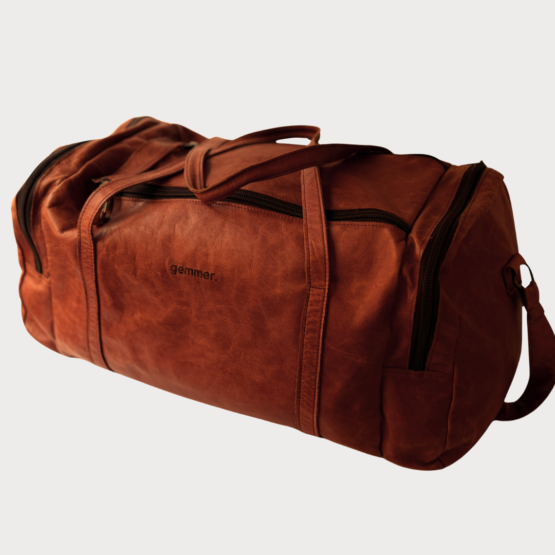 TRVL Duffel Bag Large – Side View – Tobacco Leather Bag